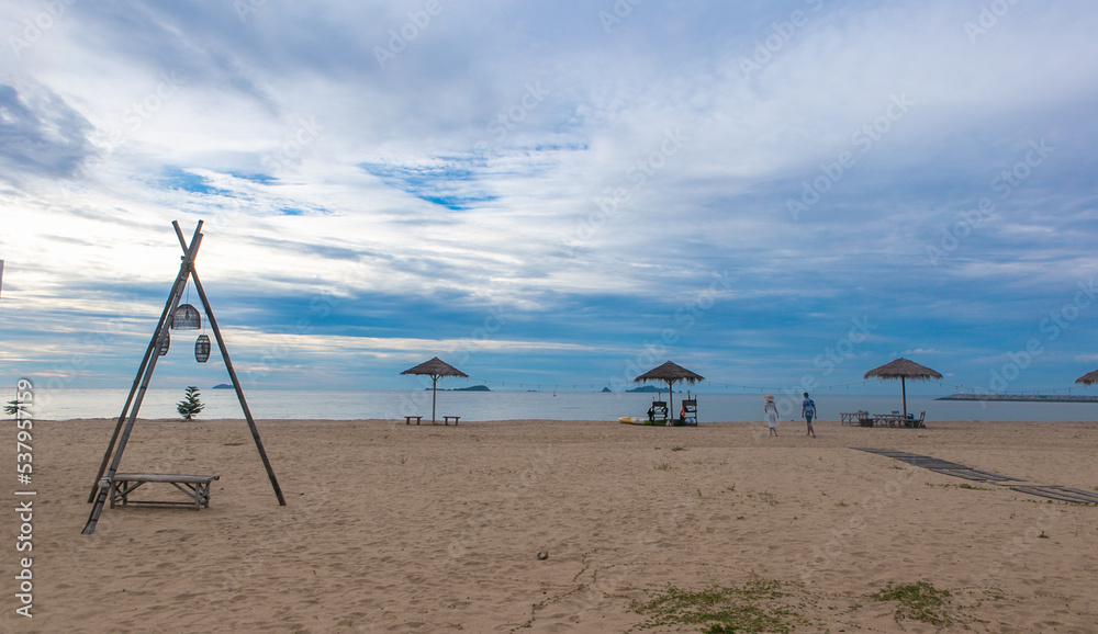 Beautiful beach and sea view in the morning with light blue sky and white cloud at the Rayong province Thailand Beautiful beach and sea view in the morning with light blue sky and white cloud at the Rayong province Thailand