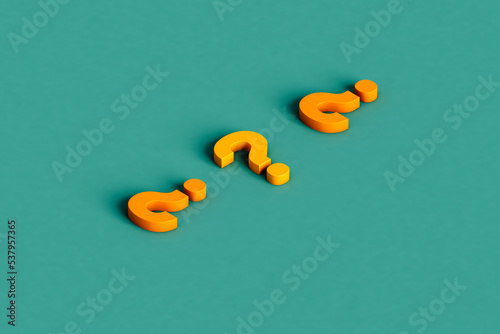 three yellow question marks
