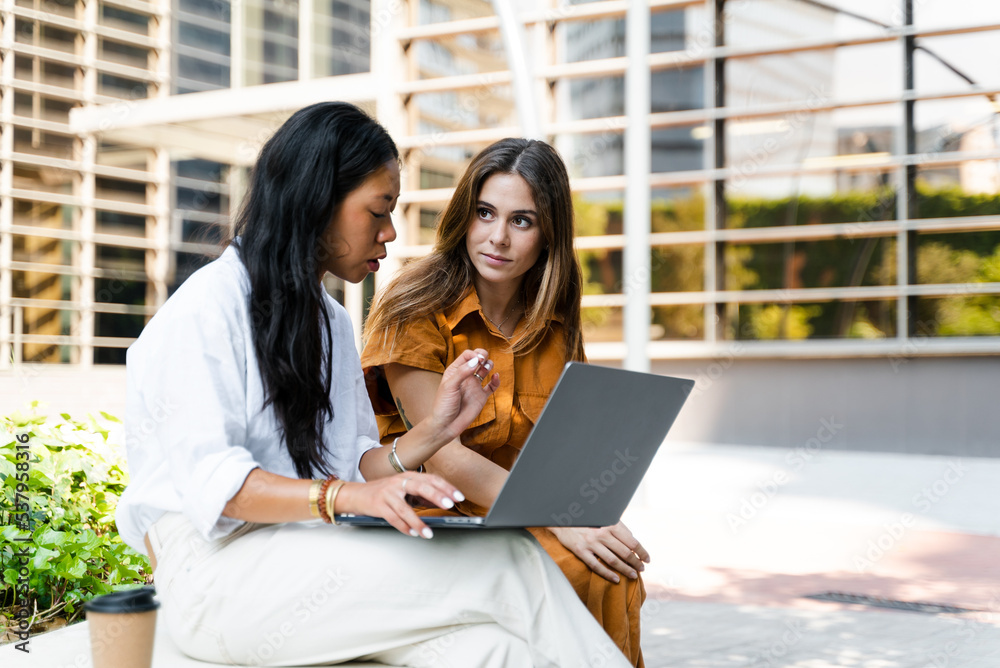 Businesswomen Working Outside Businesswomen Working Outside