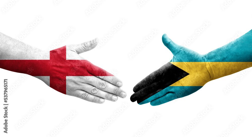 Handshake between Bahamas and England flags painted on hands, isolated transparent image.