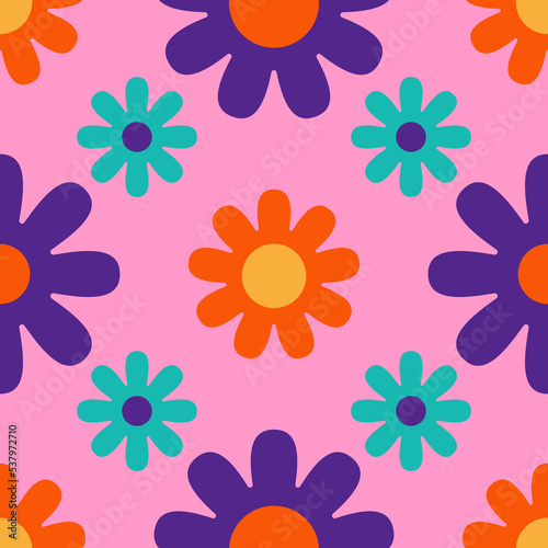 Cute floral seamless pattern on a pink background. Bright background with cute flowers in 1970s Hippy flat cartoon style. Can be used as a wallpaper  wrapping paper  textile print etc.
