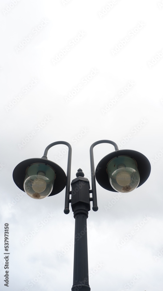 Aesthetic garden lights with a cloudy sky background Aesthetic garden lights with a cloudy sky background