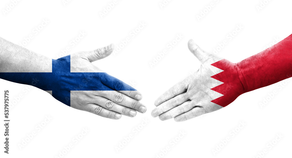 Fototapeta premium Handshake between Bahrain and Finland flags painted on hands, isolated transparent image.