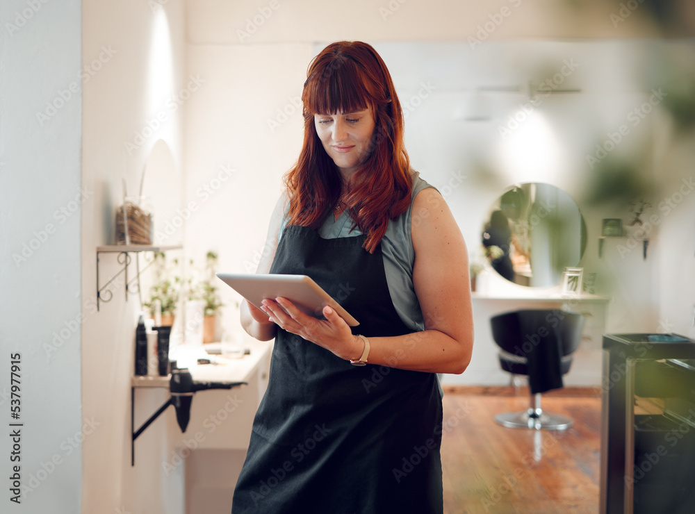 Fototapeta Salon, business and hairdresser management on tablet for cosmetic style product organisation app. Professional stylist online for inventory data update with digital device for hairstyle company.