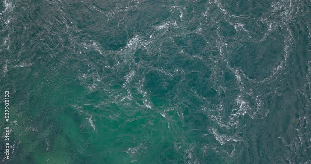 Ocean Current And Swirls In Northern Norway - aerial top down Ocean Current And Swirls In Northern Norway - aerial top down