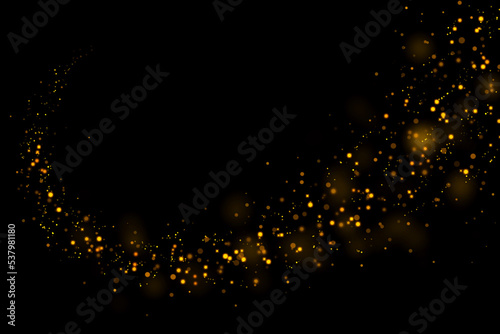 Gold glittering stars dust and bokeh background. Abstract christmas glow light texture.