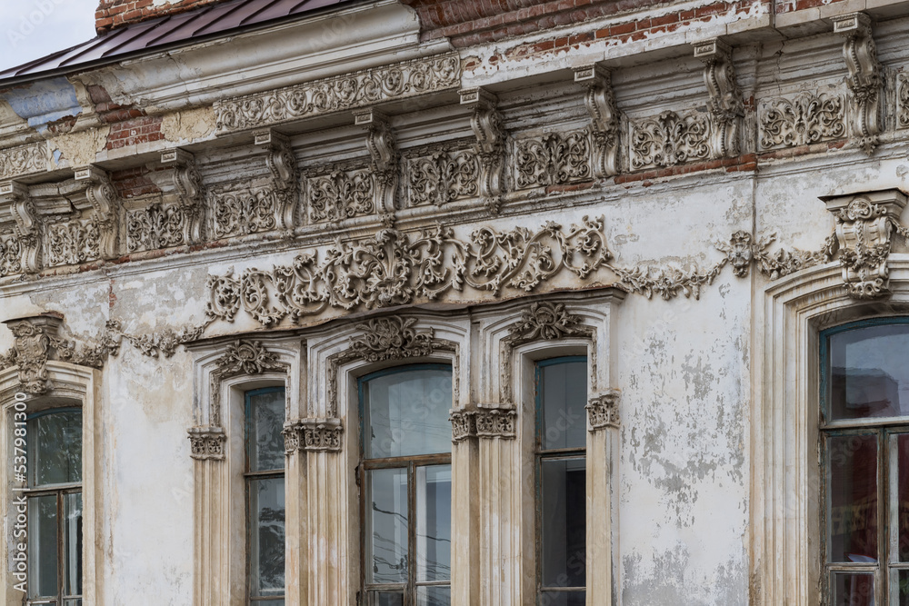 Detail of the facade of old house of the merchant Gribushin (Kungur, Ural, Russia)