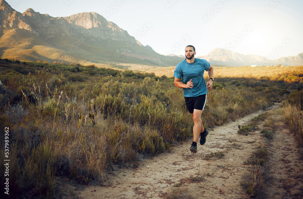 Fitness, mountain and runner running on a trail in nature for exercise, training and cardio workout outdoors. Sports, challenge and active athlete with endurance, discipline and healthy body in Italy