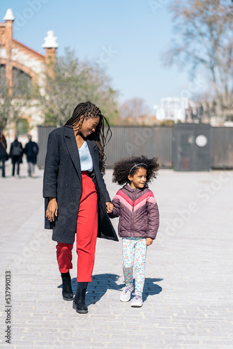 Mother and Daughter Walking