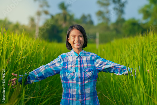 Children playing in rice field in countrysid, beautiful view nature background of rural