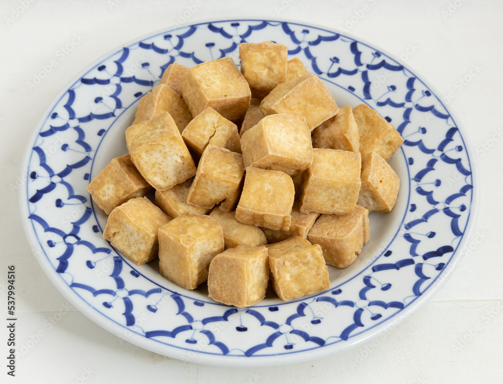 The fresh white tofu that has been deep-fried turns golden brown. The fresh white tofu that has been deep-fried turns golden brown.