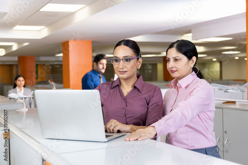 Photography Creative businesswomen working as a team in a modern workplace