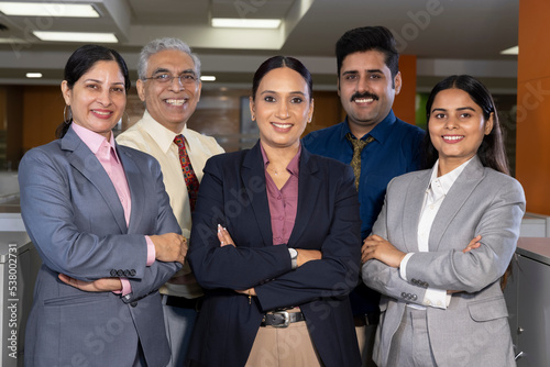 Photography Successful group of business people at the office looking at the camera smiling