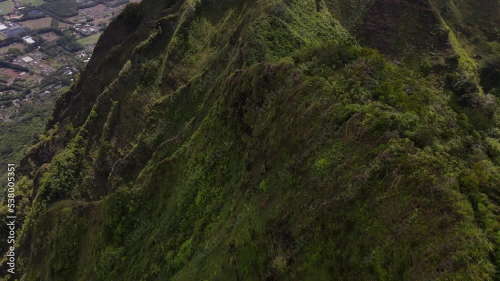 Aerial drone view of Kuliouou Ridge hiking trail in Oahu, Hawaii. Travel destination. Beauty in nature. Mountains peak Aerial drone view of Kuliouou Ridge hiking trail in Oahu, Hawaii. Travel destination. Beauty in nature. Mountains peak