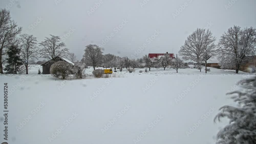 Time lapse shot of melting snow-covered during sunny day in winter with weather change between clouds,fog and sun Time lapse shot of melting snow-covered during sunny day in winter with weather change between clouds,fog and sun
