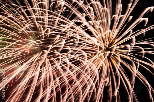 Close-up of colorful fireworks on black background