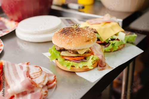 The process of making a burger. Ingredients for making a burger. Everything you need to make a burger is laid out on the table.