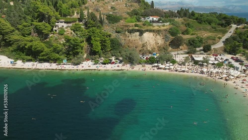 Aerial view of swimmers in Kasjuni bay and beach in Split, Croatia photo