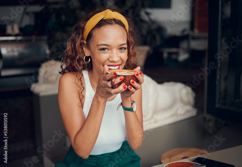 Photography Smile, happy and coffee shop young woman enjoying a cup of tea in a restaurant or cafe on her lunch break