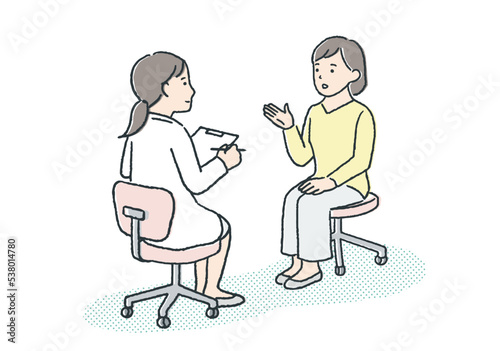 病院を受診する若い女性