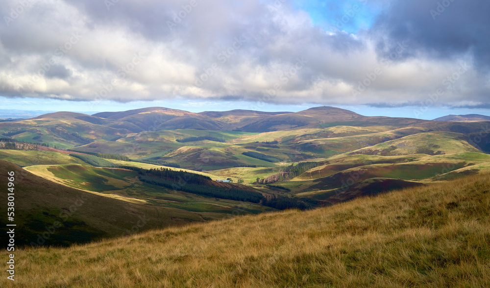 Views of Kelsocleuch Burn over the Scottish border from Windy Gyle in the Cheviot Hills in Northumberland, England