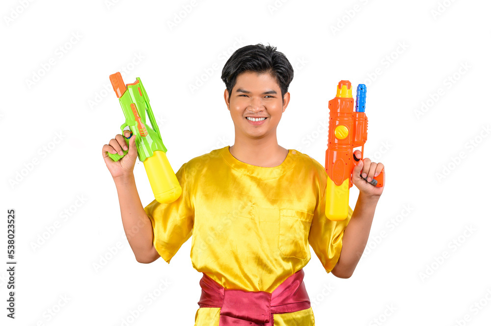 Portrait young man with water gun in Songkran Festival Portrait young man with water gun in Songkran Festival