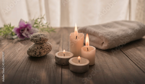 spa decor with candles, towel, flowers. Spa decoration . 