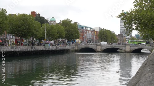 O'Connell Road Bridge Over Liffey River In Dublin City Center, Ireland. Wide Shot photo