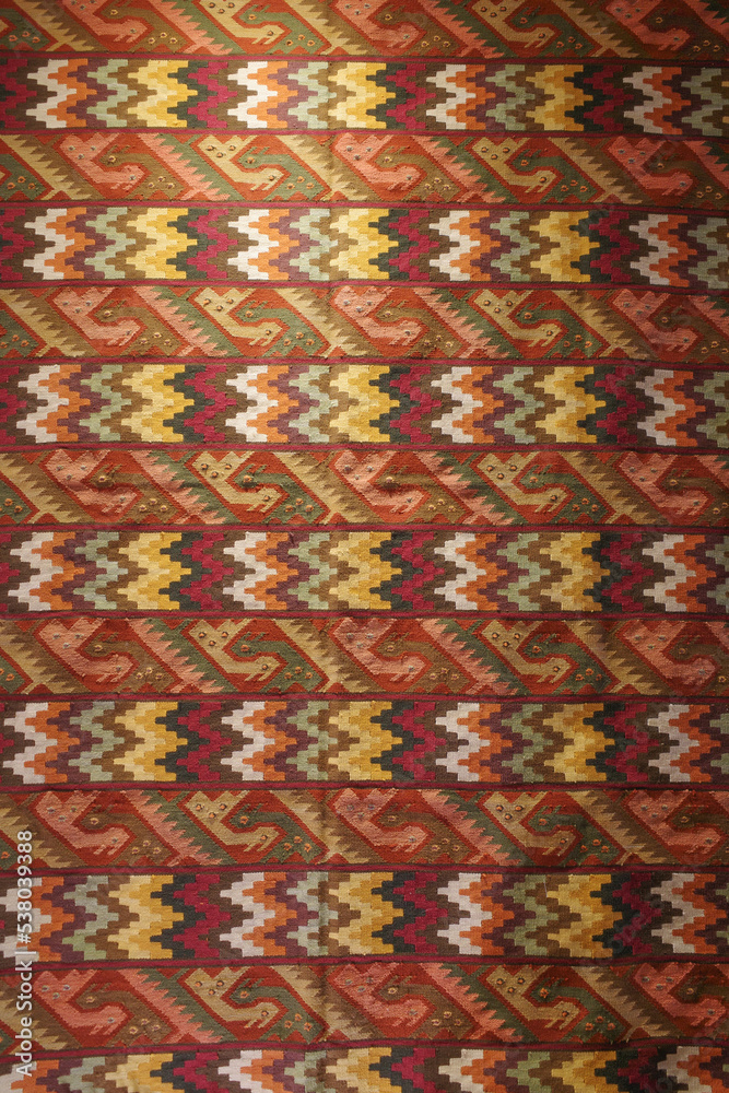 Cusco, Peru - 1 July, 2022: Andean textile weaving made with naturaly dyed Alpaca wool Cusco, Peru - 1 July, 2022: Andean textile weaving made with naturaly dyed Alpaca wool