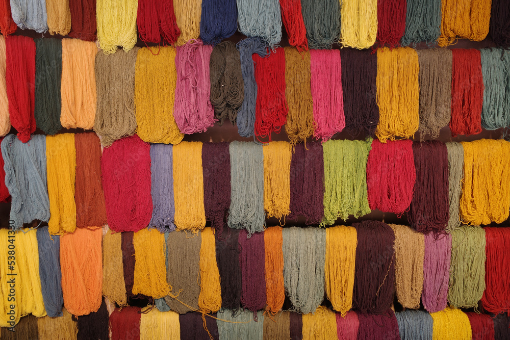 Cusco, Peru - 1 July, 2022: Andean textile weaving made with naturaly dyed Alpaca wool Cusco, Peru - 1 July, 2022: Andean textile weaving made with naturaly dyed Alpaca wool