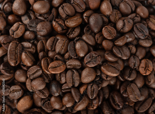 Full frame of roasted Robusta and Arabica coffee beans.
