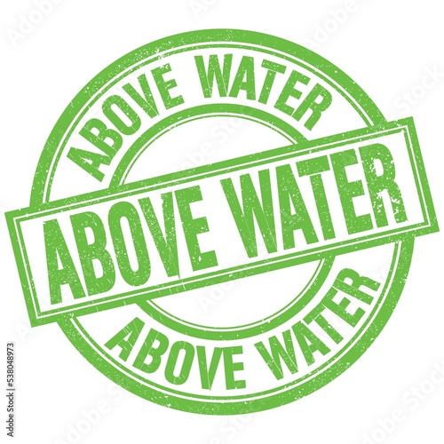 ABOVE WATER written word on green stamp sign