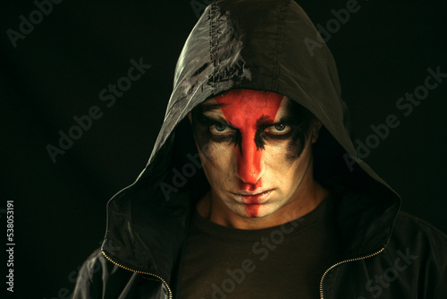 Halloween man face. Halloween concept. Dark. Horror, Evil. Photo. Background. Male. 