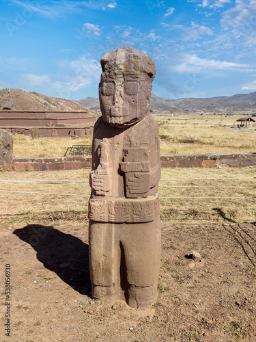 Monolith Fraile, an ancient artifact carved in sandstone grain of 3 metres of height, in Tiwanaku or Tiahuanaco pre-columbian Archaeological site, in Bolivia, South America.  photo