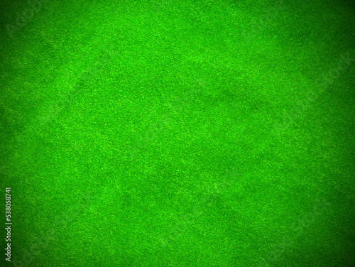 green velvet fabric texture used as background. Empty green fabric background of soft and smooth textile material. There is space for text...