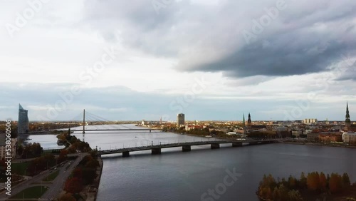 Wallpaper Mural Aerial View of Riga City the Capital of Latvia. Amazing View on the River Daugava, Old Town, National Library, Bridges Over the River and the Main Tv Tower. View From Above During Autumn Cloudy Day 4K Torontodigital.ca