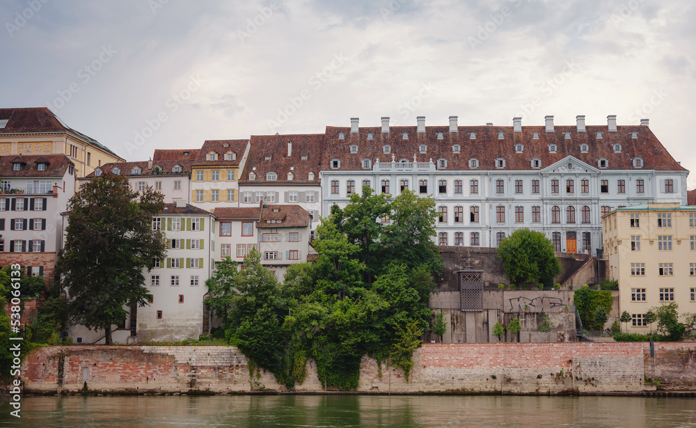 Buildings in the city centre of Basel and the Rhine river, Switzerland. Riverside of swiss city