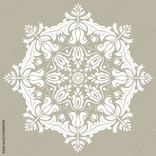 Oriental pattern with arabesques and floral elements. Traditional classic ornament. Vintage round white pattern with arabesques