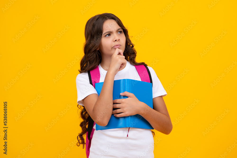 Back to school. School girl student with school bag backpack hold book on isolated studio background. Kids education concept. Back to school. School girl student with school bag backpack hold book on isolated studio background. Kids education concept.