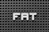 White alphabet letter in word FAT (Obesity or abbreviation of factory acceptance test, file allocation table) on black pegboard background