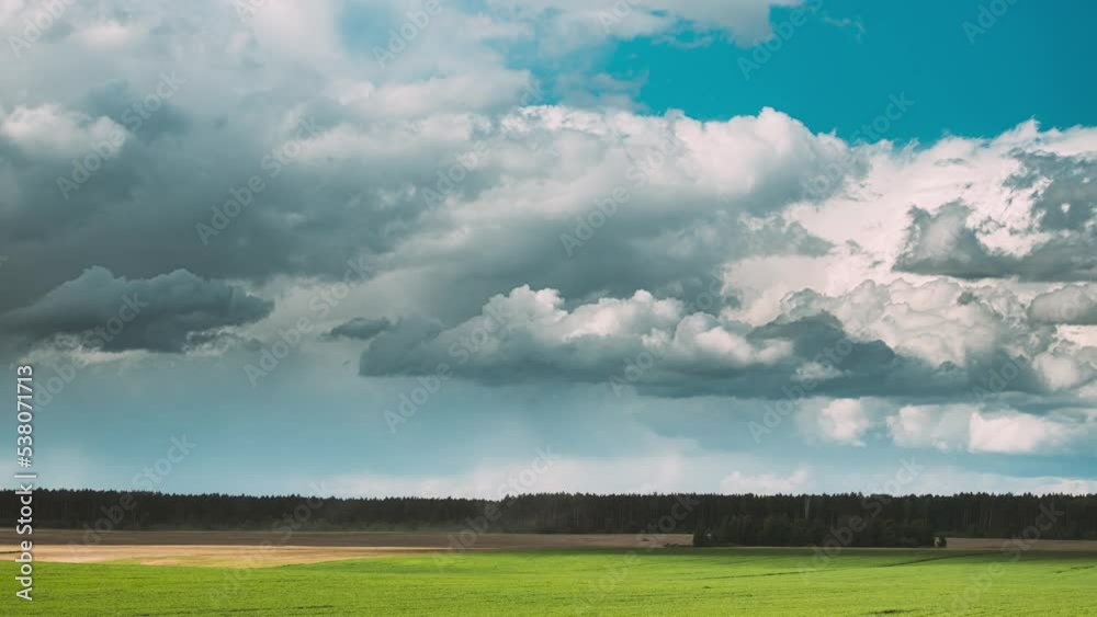 Dramatic Sky With Clouds Above Countryside Rural Field. Colorful Cloudy Blue Sky Fluffy Clouds Above Grassland. Sky With Clouds On Horizon Above Rural Landscape Meadow. Background 4k Time Lapse Dramatic Sky With Clouds Above Countryside Rural Field. Colorful Cloudy Blue Sky Fluffy Clouds Above Grassland. Sky With Clouds On Horizon Above Rural Landscape Meadow. Background 4k Time Lapse