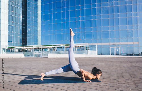 Принти на полотні Flexible sportswoman doing stretching exercises for balance and plasticity body