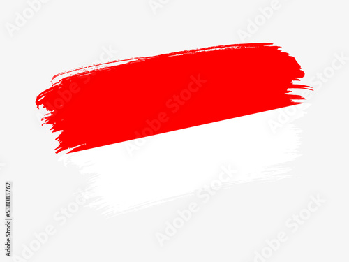 Indonesia flag made in textured brush stroke. Patriotic country flag on white background