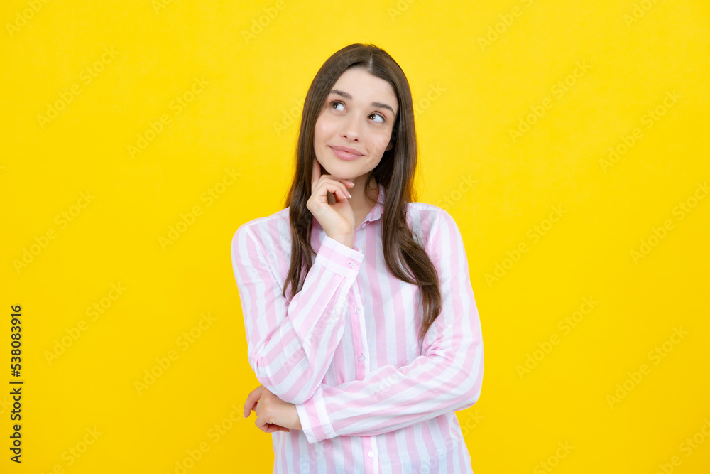 Portrait of young woman thinking, looking up empty space. Thoughtful serious model in studio looking away. Girl thought choose decide solve problems. Portrait of young woman thinking, looking up empty space. Thoughtful serious model in studio looking away. Girl thought choose decide solve problems.