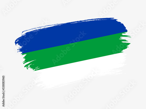 Komi Republic flag made in textured brush stroke. Patriotic country flag on white background