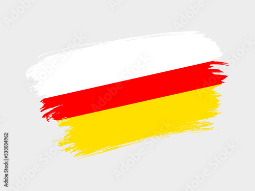 South Ossetia flag made in textured brush stroke. Patriotic country flag on white background