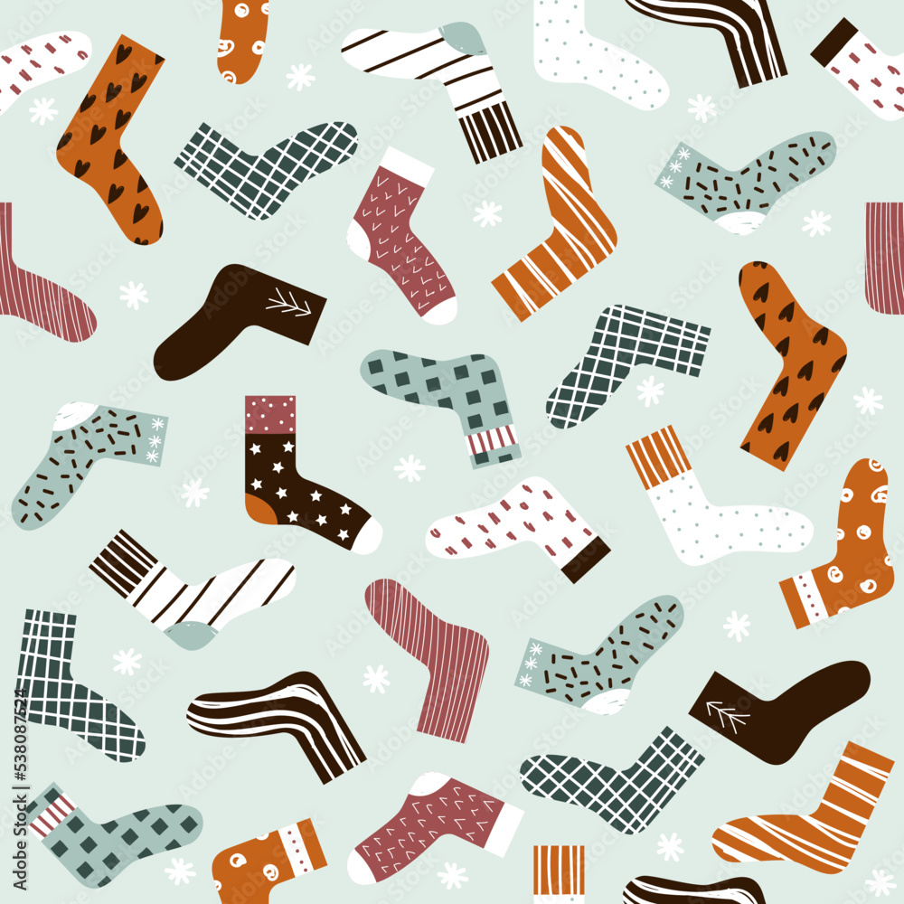 Seamless pattern with colorful socks. Winter print. Vector hand drawn illustration.