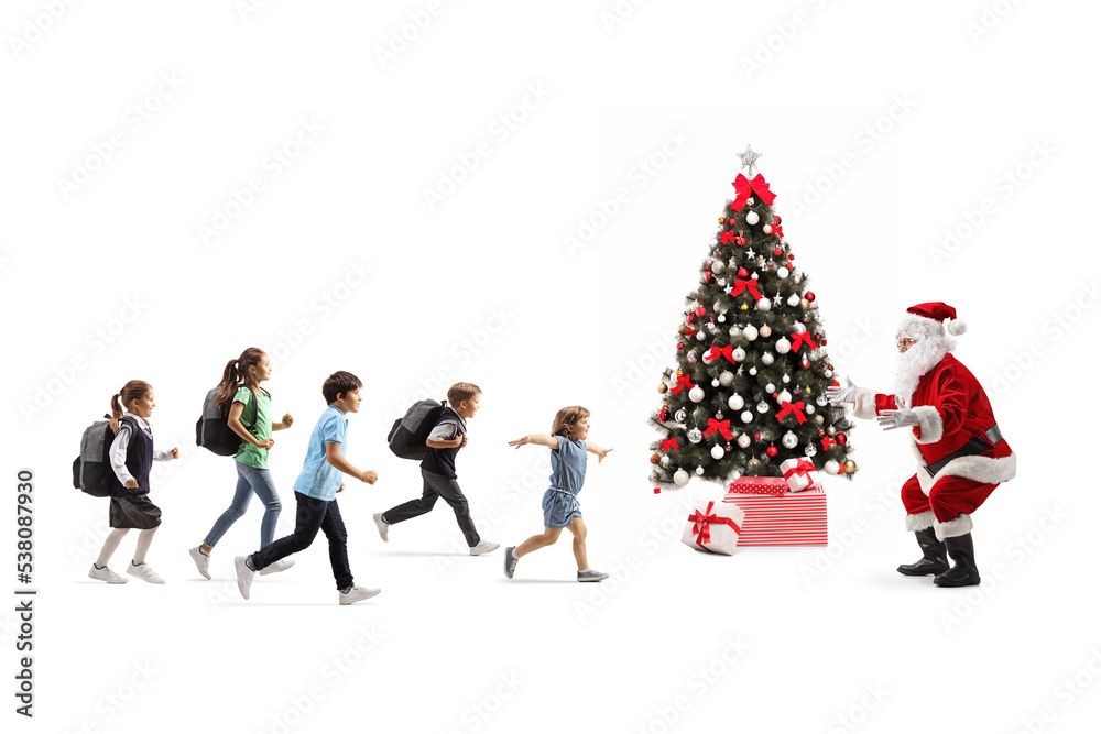 Group of children running to hug santa claus Group of children running to hug santa claus