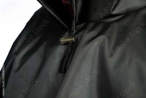Strategic waterproof raincoat in black on a white background