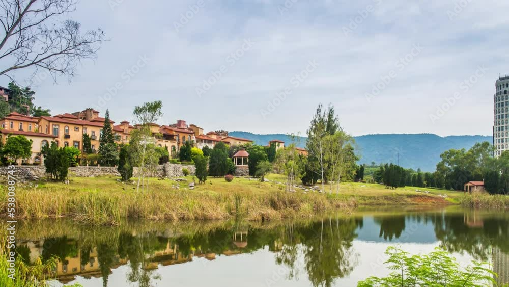 Time lapse of Italian-style building is on a mountain with a river beneath it like in a fairy tale. Time lapse of Italian-style building is on a mountain with a river beneath it like in a fairy tale.